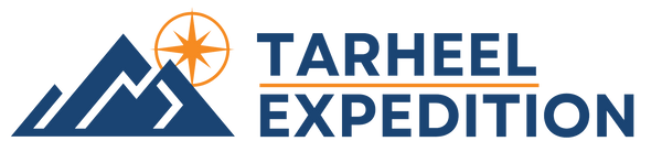 Logo for Tarheel Expedition featuring stylized blue mountains with a white path, an orange compass rose above the peaks, and the words “Tarheel Expedition” in bold blue text with an orange underline.