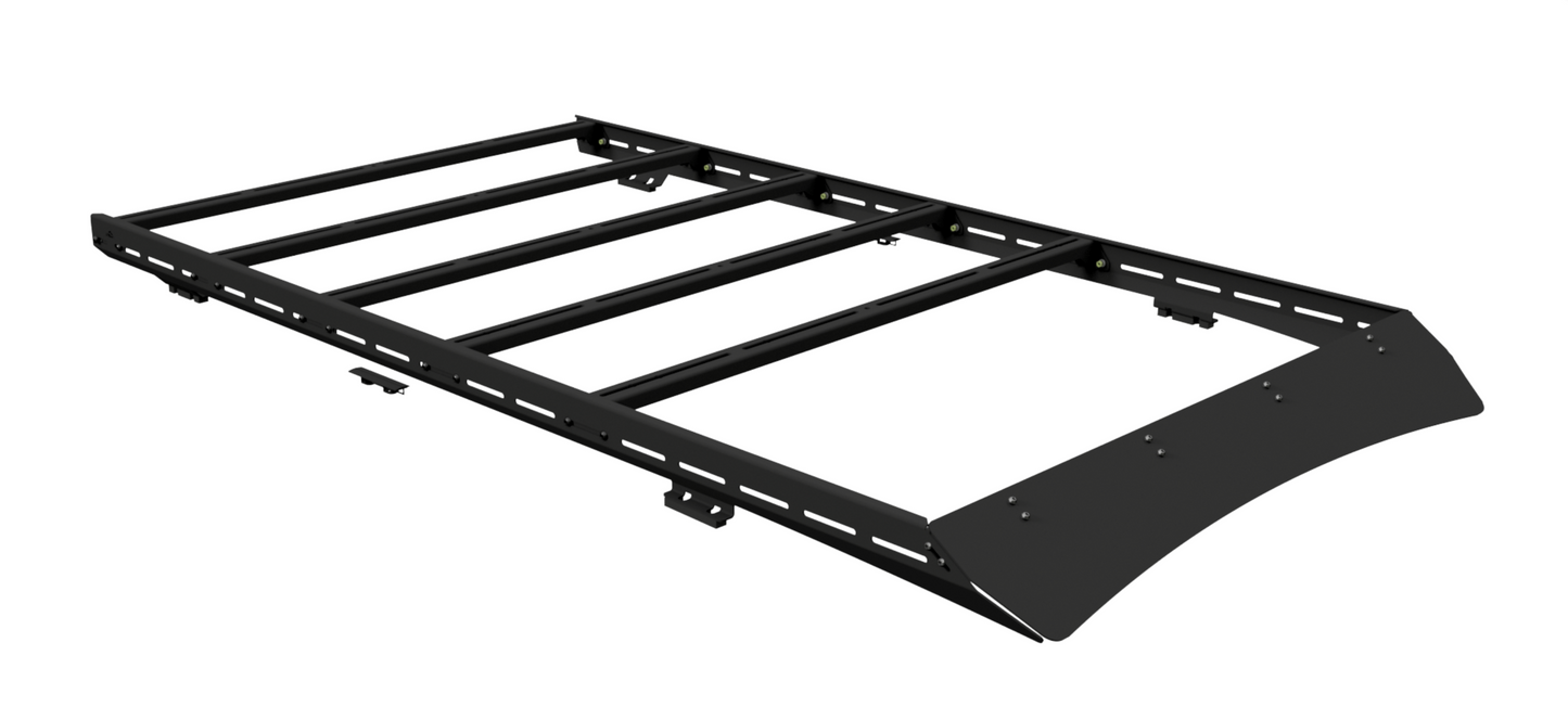 The Ruggedized Low Profile Rack - GX460 is a black, flat rectangular roof rack with heavy-duty crossbars, side rails with mounting points, and a front angled wind deflector.